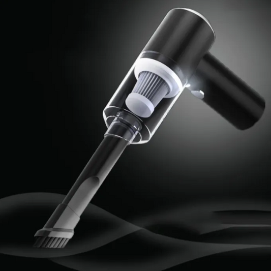 Black handheld vacuum cleaner on a dark background